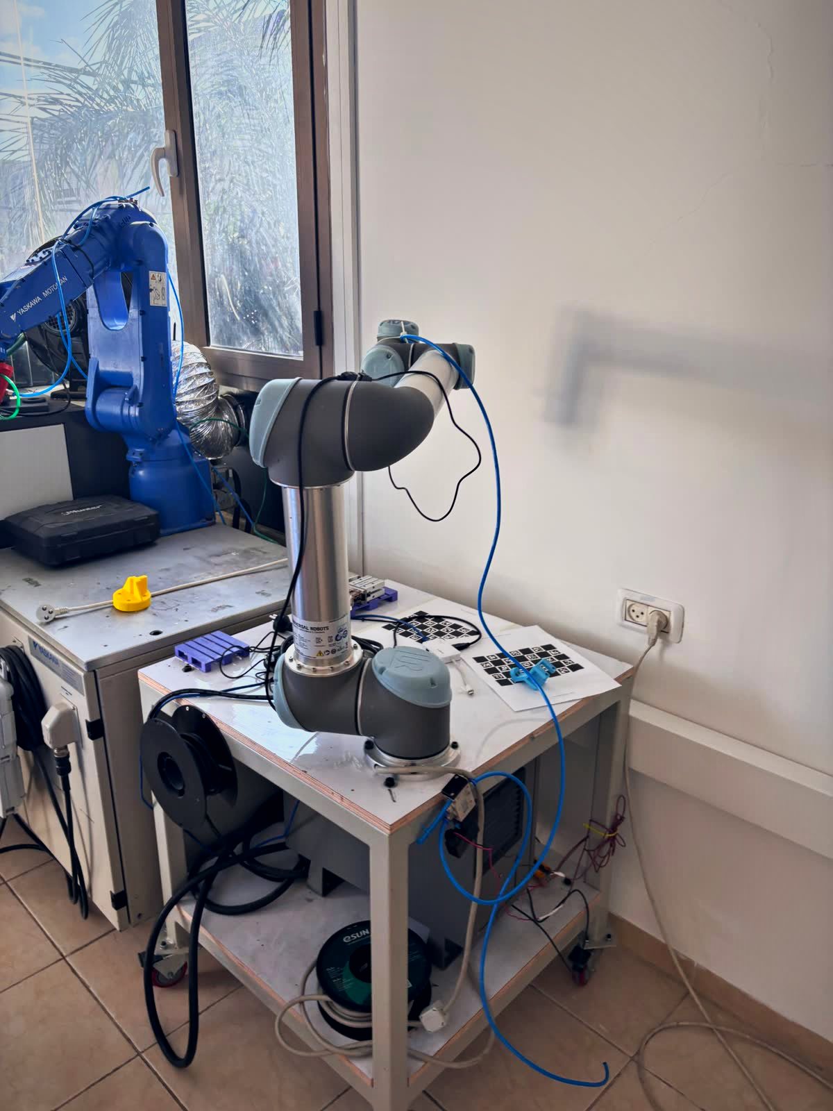UR5e cobot mounted on a mobile cart in the Haifa lab